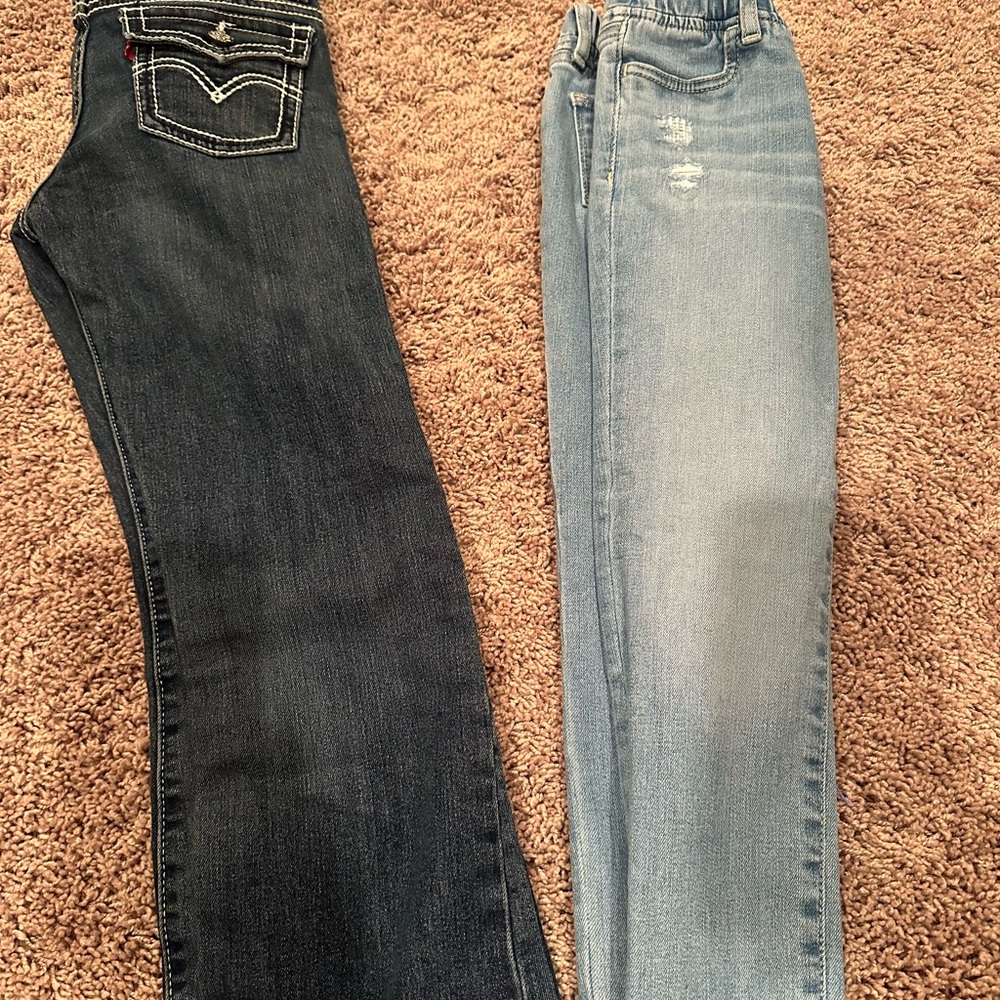 Girls size 10. Jeans. Worn once. Super cute style.